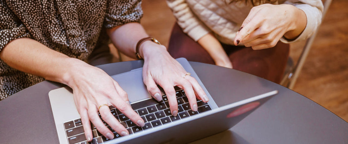 Two Women On Laptop